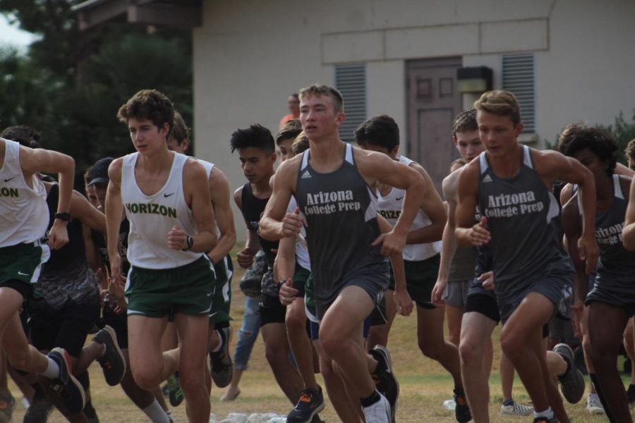 The Boys Cross Country team starting off their race at Ojo Rojo Invitational. Image taken by Morgan N.
